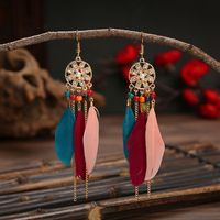 Ethnic Style Flower Feather Metal Hollow Out Inlay Artificial Pearls Rhinestones Women's Drop Earrings main image 2