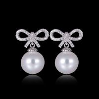 1 Pair Elegant Bow Knot Inlay Copper Alloy Artificial Pearls Zircon Drop Earrings main image 4