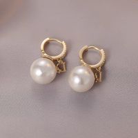 1 Pair Elegant Lady Geometric Bow Knot Plating Inlay Imitation Pearl Alloy Artificial Gemstones Drop Earrings main image 2