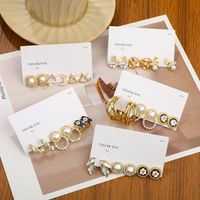 1 Set Elegant Luxurious Lady Flower Inlay Alloy Artificial Gemstones Artificial Pearls Ear Studs main image 1
