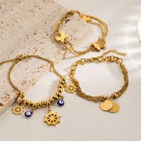 Casual Devil's Eye Butterfly Stainless Steel Imitation Pearl Layered Gold Plated Bracelets main image 1