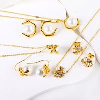 Classic Style Geometric Bow Knot Stainless Steel Plating Inlay Artificial Gemstones Pendant Necklace main image 1