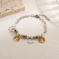 Casual Artistic Cross Devil's Eye Butterfly Stainless Steel Imitation Pearl Layered Gold Plated Bracelets main image 2