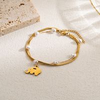 Casual Artistic Cross Devil's Eye Butterfly Stainless Steel Imitation Pearl Layered Gold Plated Bracelets main image 5