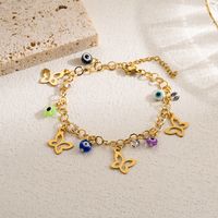 Casual Artistic Cross Devil's Eye Butterfly Stainless Steel Imitation Pearl Layered Gold Plated Bracelets main image 3