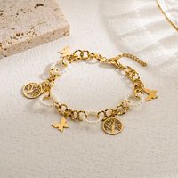 Casual Artistic Cross Devil's Eye Butterfly Stainless Steel Imitation Pearl Layered Gold Plated Bracelets sku image 1