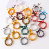 Casual Simple Style Solid Color Bow Knot Plastic Silica Gel Gold Foil Women's Wristband main image 6