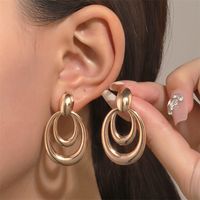 Simple Style Streetwear Solid Color Metal Copper Plating Hollow Out Inlay Zircon 18k Gold Plated Gold Plated Silver Plated Women's Earrings main image 5