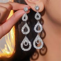 Glam Shiny Water Droplets Rhinestone Plating Hollow Out Inlay Rhinestones Silver Plated Women's Drop Earrings sku image 1