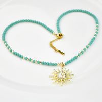 Stainless Steel Artificial Crystal Alloy Gold Plated Simple Style Beaded Sun Pendant Necklace main image 3