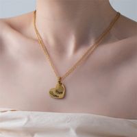 Élégant Dame Forme De Cœur Acier Au Titane Placage Pendentif main image 2