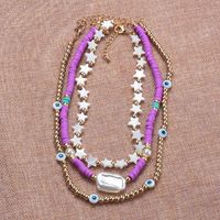Casual Ethnic Style Star Eye Alloy Soft Clay Beaded Pearl Plating Women's Necklace main image 5