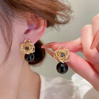 Retro Flower Alloy Plating Inlay Artificial Pearls Women's Ear Studs sku image 2