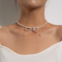 Elegant Sweet Bow Knot Imitation Pearl Alloy Beaded Plating Inlay Rhinestones Women's Necklace main image 1
