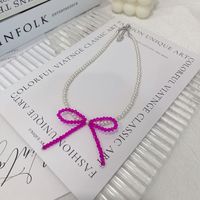 Simple Style Bow Knot Artificial Crystal Artificial Pearl Beaded Women's Pendant Necklace sku image 1