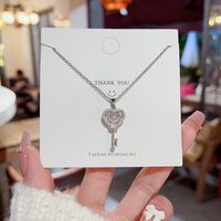 Streetwear Heart Shape Key Titanium Steel Copper Inlay Artificial Gemstones Pendant Necklace main image 5