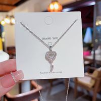 Streetwear Heart Shape Key Titanium Steel Copper Inlay Artificial Gemstones Pendant Necklace main image 1