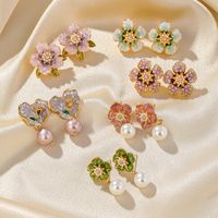 1 Pair Glam Luxurious Commute Heart Shape Flower Epoxy Plating Inlay Imitation Pearl Copper Artificial Crystal 18k Gold Plated Earrings main image 1