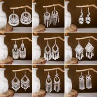 1 Pair Retro Leaf Sector Tassel Plating Hollow Out Inlay Alloy Turquoise Drop Earrings main image 1