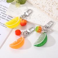 Cute Lemon Orange Fruit Alloy Resin Silica Gel Bag Pendant Keychain main image 1