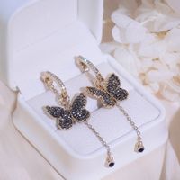 1 Par Estilo Vintage Exagerado Mariposa Embutido Cobre Diamantes De Imitación Pendientes De Gota sku image 1