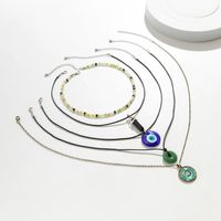Wholesale Jewelry Simple Style Classic Style Eye Alloy Glass Iron Beaded Layered Pendant Necklace main image 3