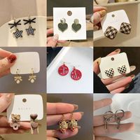 1 Pair Ig Style Sweet Lattice Heart Shape Bow Knot Enamel Plating Inlay Alloy Rhinestones Pearl 18k Gold Plated Drop Earrings main image 1