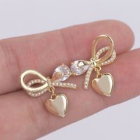 1 Pair Fairy Style French Style Simple Style Heart Shape Bow Knot Plating Inlay Copper Artificial Pearls Zircon 14k Gold Plated Ear Studs main image 1