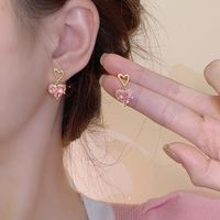 1 Pair Glam Exaggerated Heart Shape Flower Bow Knot Plating Inlay Alloy Artificial Crystal Artificial Rhinestones Artificial Pearls Gold Plated Silver Plated Drop Earrings main image 9