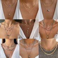 Hip-hop Punk Cool Style Sun Devil's Eye Snake Alloy Plating Inlay Artificial Rhinestones Glass Gold Plated Silver Plated Women's Layered Necklaces main image 1