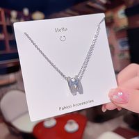 Ig Style Sweet Four Leaf Clover Butterfly Shell Titanium Steel Plating Inlay Opal Shell Zircon Pendant Necklace main image 3