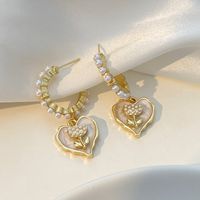 1 Paar Ig-stil Herzform Blume Überzug Inlay Legierung Künstliche Perlen 14 Karat Vergoldet Tropfenohrringe main image 3