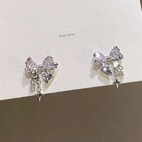 1 Pair Casual Simple Style Star Moon Bow Knot Asymmetrical Plating Inlay Alloy Rhinestones Pearl Ear Studs sku image 2