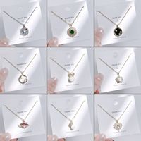 Streetwear Bow Knot Titanium Steel Inlay Artificial Gemstones Charms Pendant Necklace main image 1