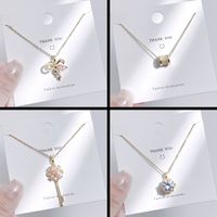 Streetwear Bow Knot Titanium Steel Inlay Artificial Gemstones Charms Pendant Necklace main image 4