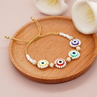 Mignon L'oeil Du Diable Smiley Fleur Arylique Argile Molle Perlé Tresser Femmes Bracelets main image 5