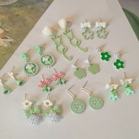 1 Pair Sweet Cat Flower Bow Knot Stoving Varnish Inlay Alloy Artificial Pearls Earrings main image 1