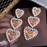 1 Pair Simple Style Heart Shape Inlay Alloy Pearl Zircon Drop Earrings main image 1