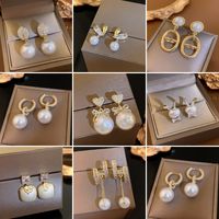 1 Pair Elegant Letter Bow Knot Inlay Metal Copper Pearl Zircon Drop Earrings main image 3