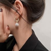 1 Pair Elegant Letter Bow Knot Inlay Metal Copper Pearl Zircon Drop Earrings main image 2