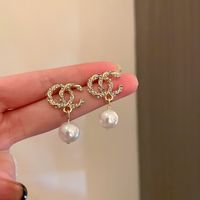 1 Pair Elegant Letter Bow Knot Inlay Metal Copper Pearl Zircon Drop Earrings sku image 1