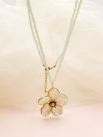 304 Stainless Steel Gold Plated Classical Vintage Style Beaded Plating Inlay Flower Crystal Shell Zircon main image 1