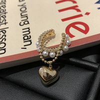1 Piece 1 Pair Streetwear Heart Shape Plating Inlay Artificial Pearl Alloy Artificial Diamond Ear Clips main image 2