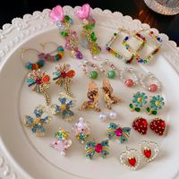 1 Pair Casual Sweet Heart Shape Flower Bow Knot Beaded Plating Inlay Copper Crystal Earrings main image 1