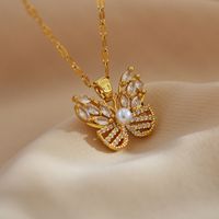 Sweet Simple Style Butterfly Titanium Steel Copper Plating Hollow Out Inlay Pearl Zircon Pendant Necklace main image 1