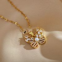 Sweet Simple Style Butterfly Titanium Steel Copper Plating Hollow Out Inlay Pearl Zircon Pendant Necklace main image 2