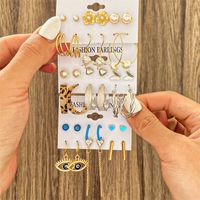1 Set Casual Modern Style Round Heart Shape Butterfly Enamel Plating Inlay Arylic Alloy Metal Rhinestones Pearl Zircon 18k Gold Plated Gold Plated Silver Plated Earrings main image 4