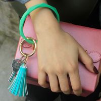 Simple Style Tassel Solid Color Pu Leather Silica Gel Women's Bag Pendant Keychain main image 4
