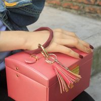 Simple Style Tassel Solid Color Pu Leather Silica Gel Women's Bag Pendant Keychain main image 3