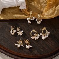 1 Pair Vintage Style Simple Style Star Flower Plating Inlay Copper Freshwater Pearl Zircon 14k Gold Plated 18k Gold Plated Ear Studs main image 1